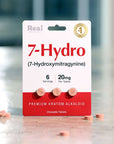 A package labeled 7-Hydro (7-Hydroxymitragynine) with six chewable tablets, each containing 20mg. The packaging is white and red, and the product is described as a premium kratom alkaloid.