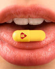 Kratom capsule on tounge