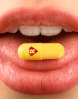 Kratom capsule on tounge
