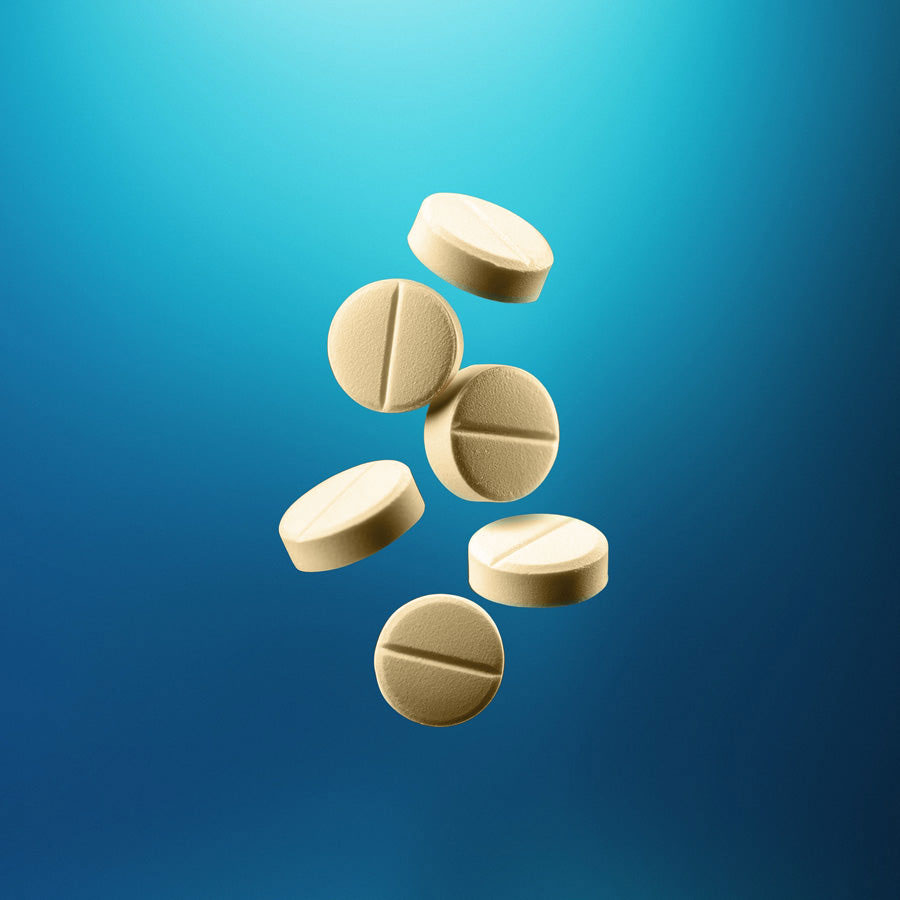 Pills on ble background