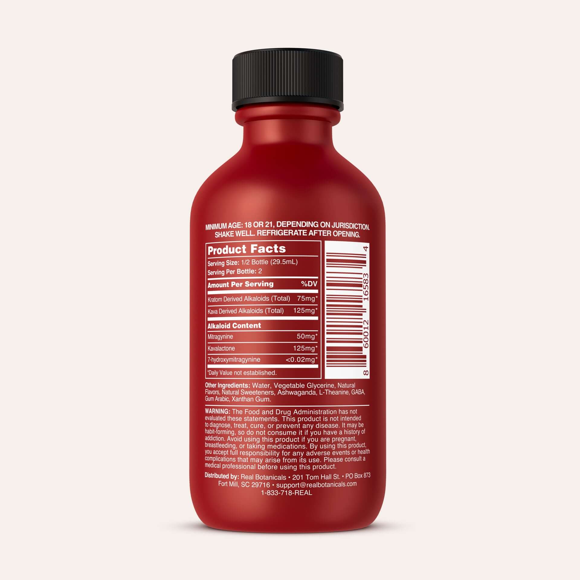 A red bottle of Real Botanicals Kratom Shot with a white label showing product facts, ingredients, and manufacturer information; the cap is sealed and the background is off-white.