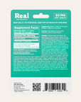 Teal label with supplement facts and branding for Real Botanicals on a white background