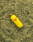 yellow capsule of kratom powder - Real Botanicals