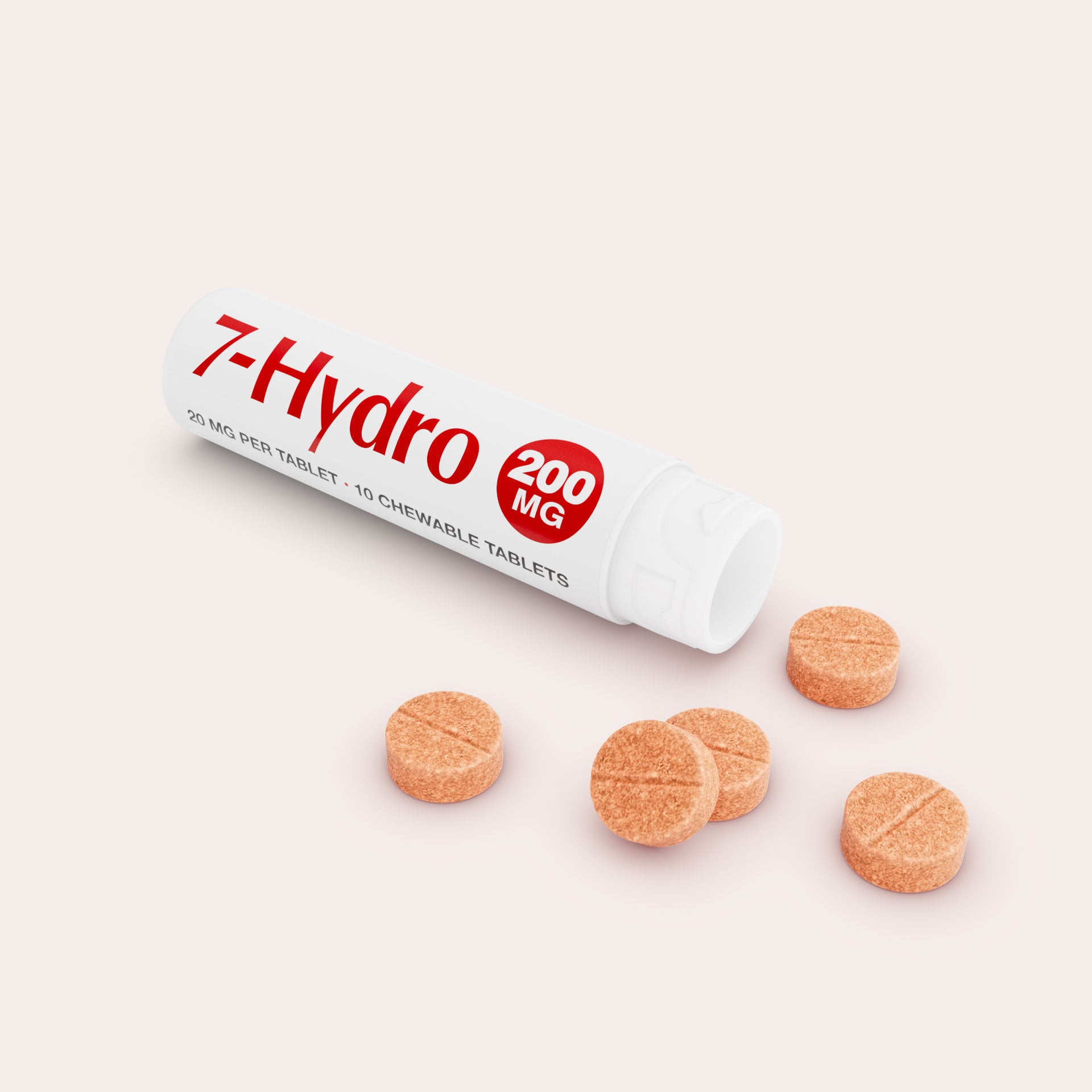 A white tube labeled 7-Hydro 200 MG lies open with five round, orange chewable tablets scattered in front of it on a light background. 
