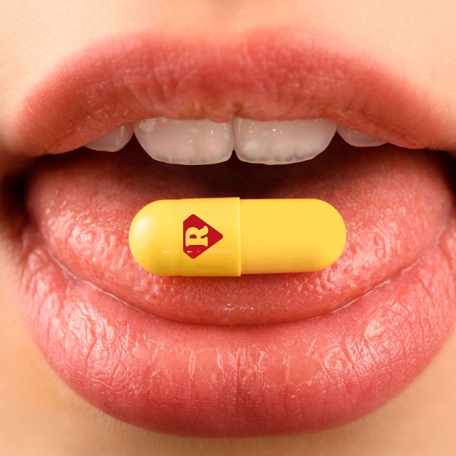 Kratom capsule on tounge