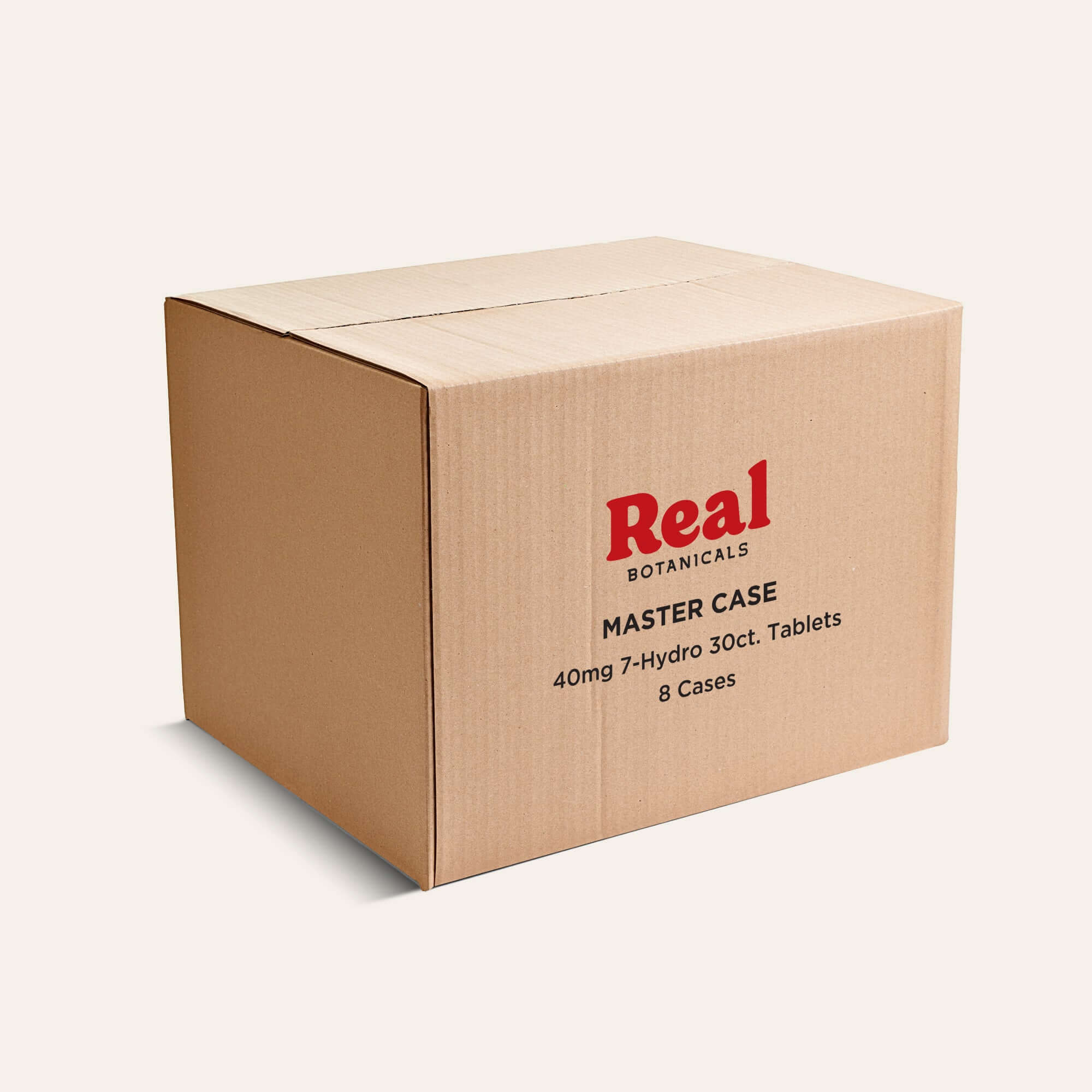Cardboard box with 'Real Botanicals' branding on a white background