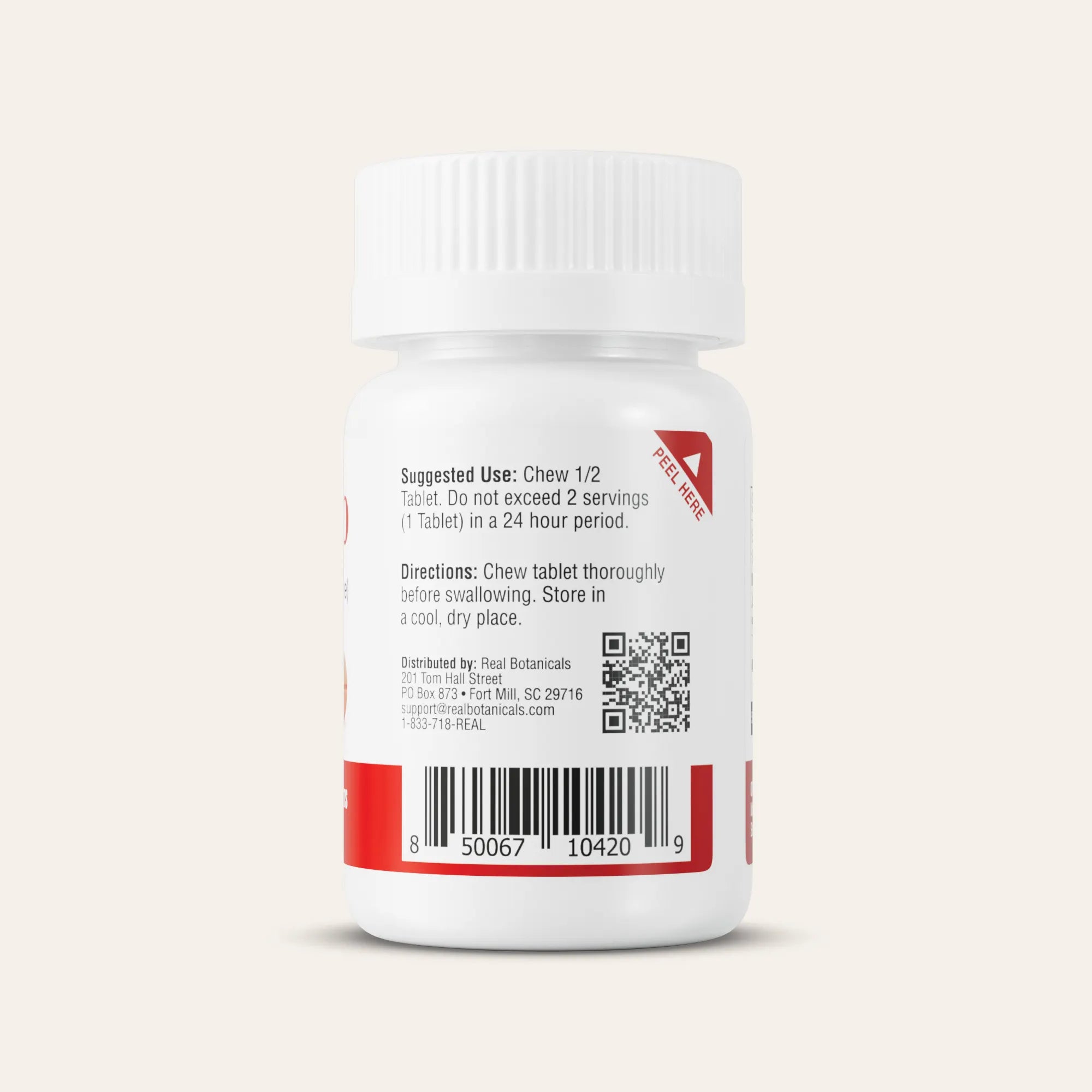 Bottle of supplements with label on a light gray background