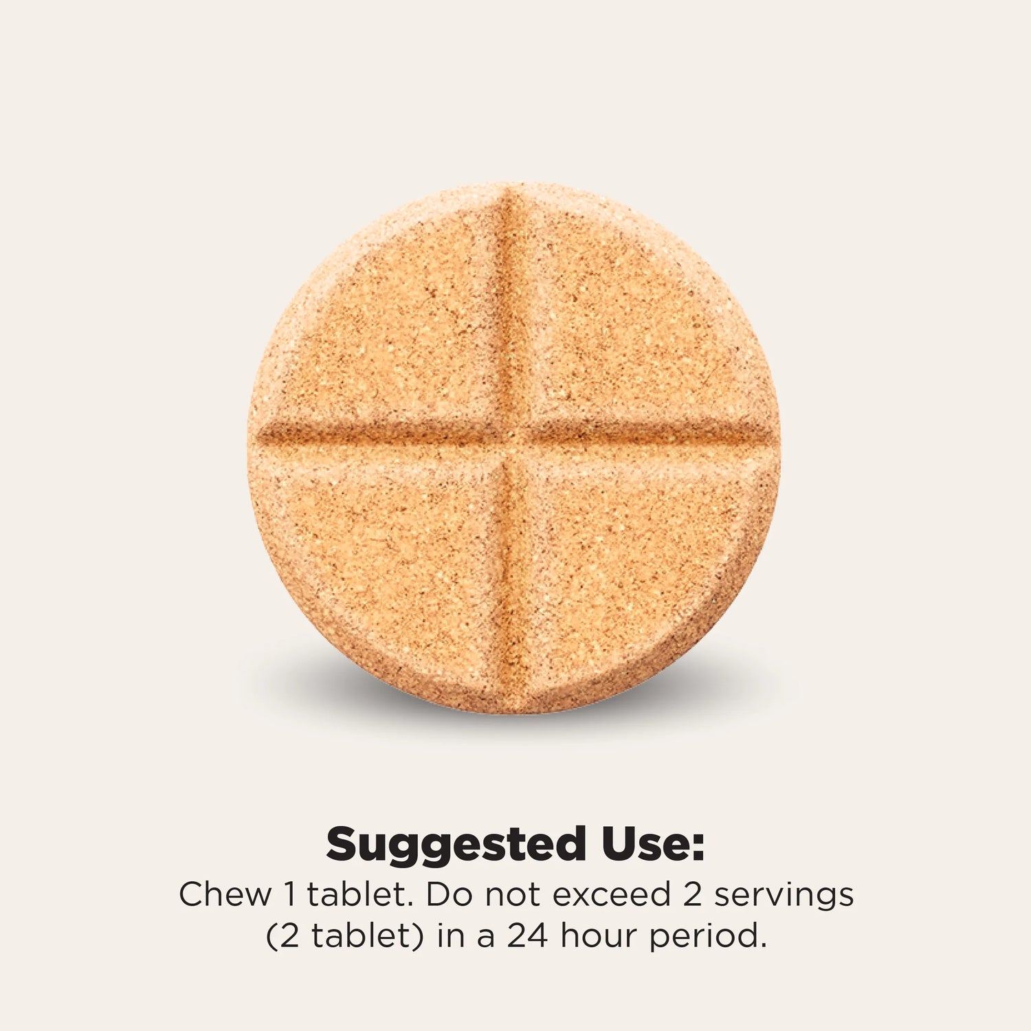 A single round, cross-sectioned beige tablet centered on a light warm-gray background, with text below reading 'Suggested Use: Chew 1 tablet. Do not exceed 2 servings (2 tablet) in a 24 hour period.