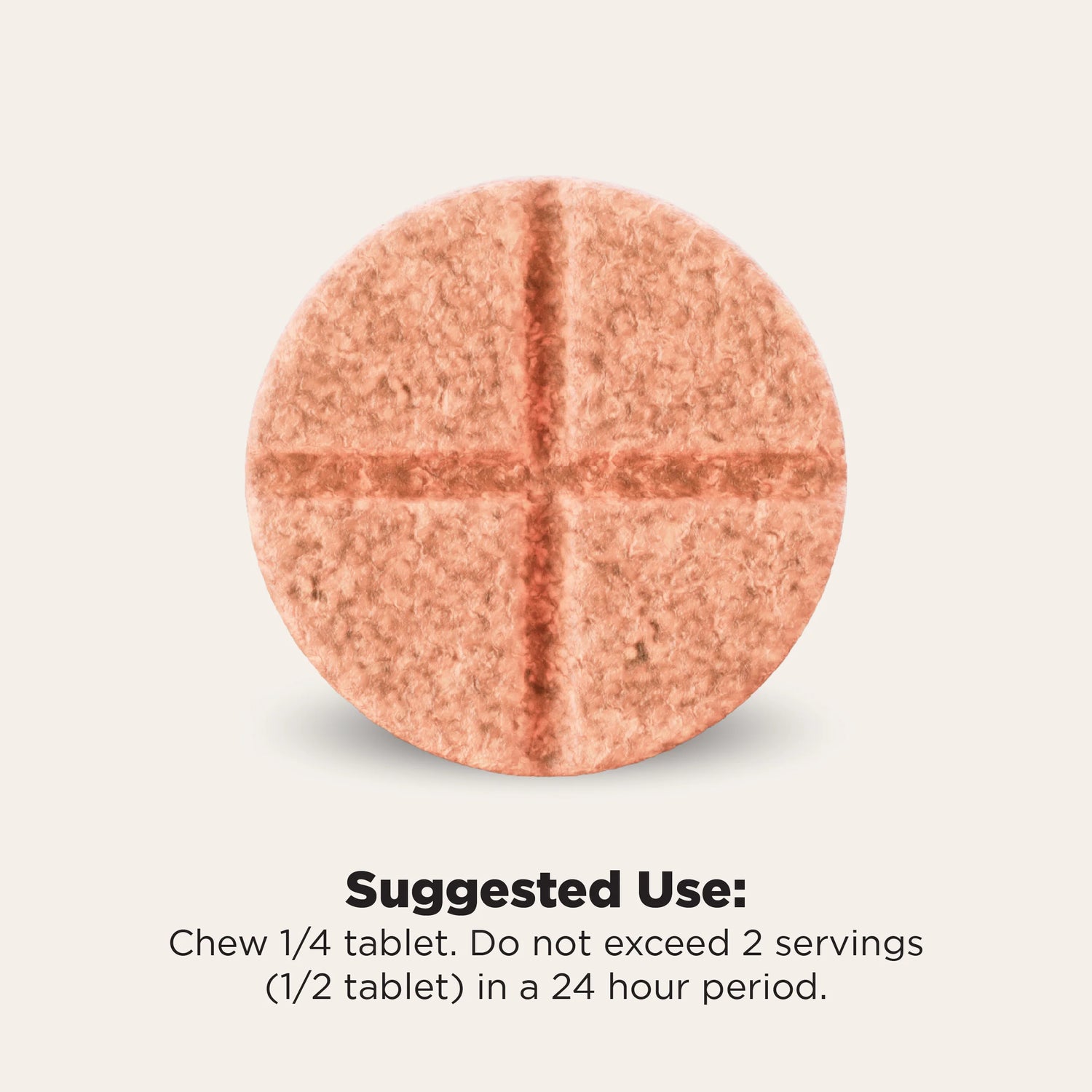A round, cross-sectioned peach-colored tablet centered on a light beige background, with text below reading 'Suggested Use: Chew 1/4 tablet. Do not exceed 2 servings (1/2 tablet) in a 24 hour period.