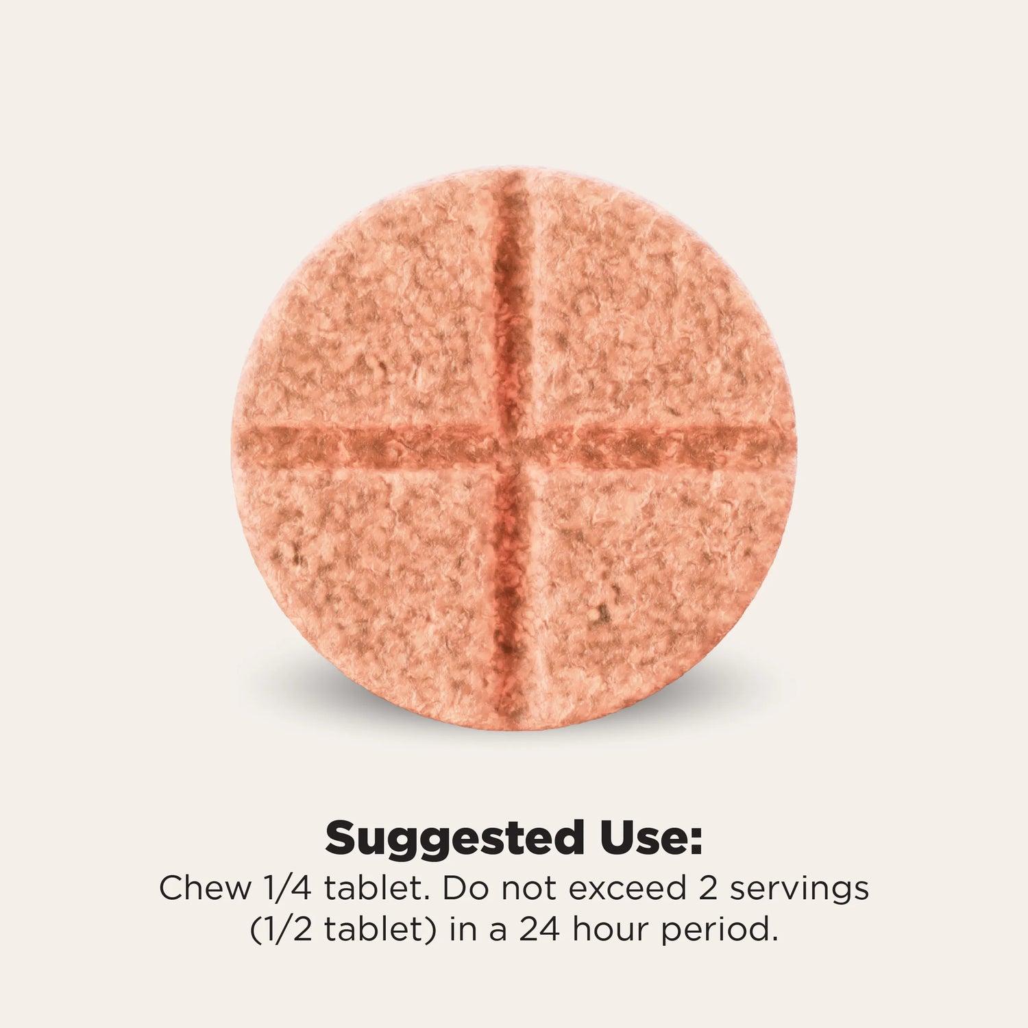 A round, cross-sectioned peach-colored tablet centered on a light beige background, with text below reading 'Suggested Use: Chew 1/4 tablet. Do not exceed 2 servings (1/2 tablet) in a 24 hour period.