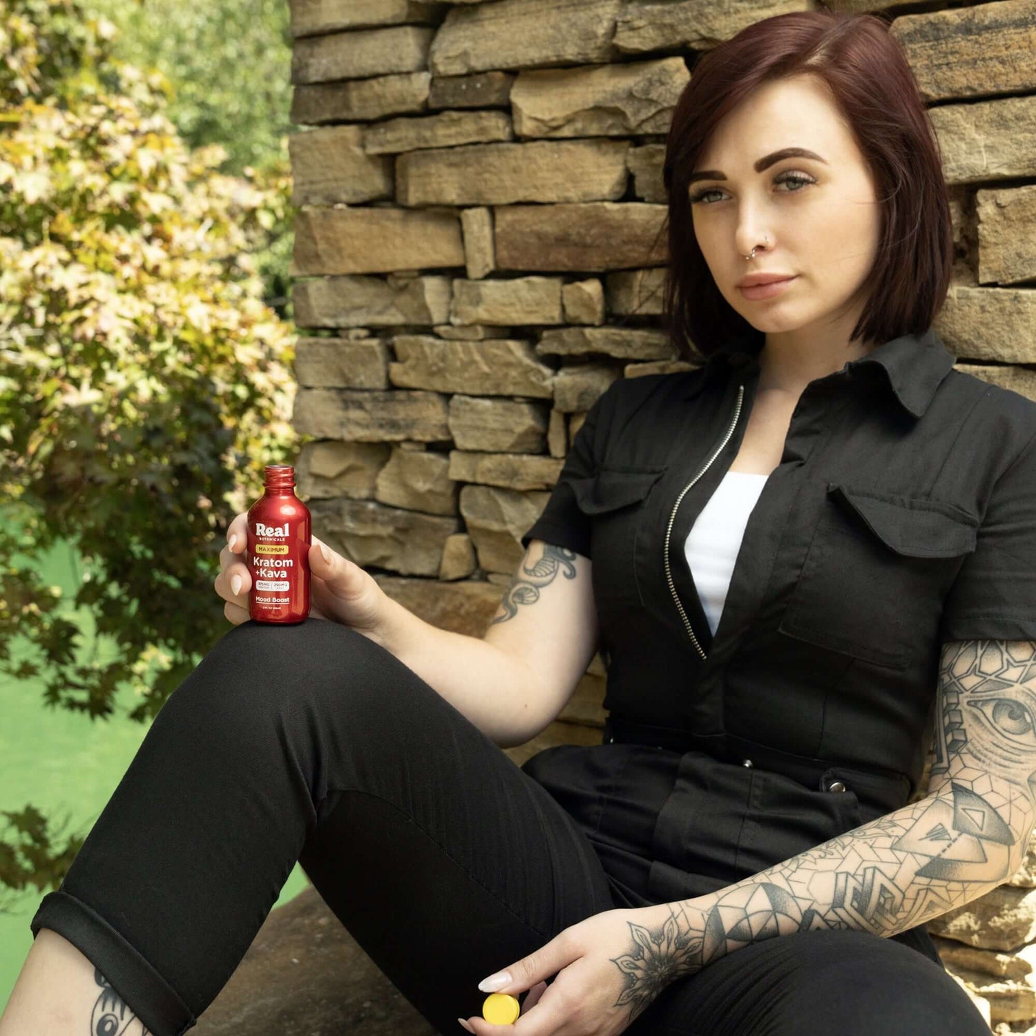 Woman relaxing with Maxium Strength kratom and kava shot