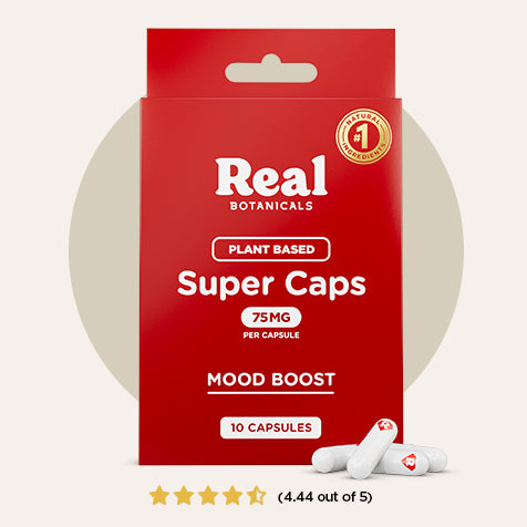 Red box of Real Botanicals Super Caps with white capsules on a beige background