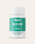 Supplement bottle labeled 'Real Botanicals pseudo' on a light beige background