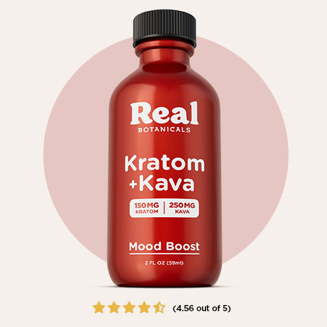Red bottle of Real Botanicals Kratom + Kava on a light pink background
